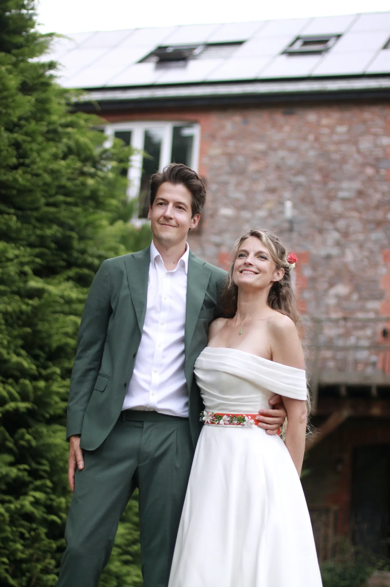 Anton and Morgane on their wedding day outside the Mill House